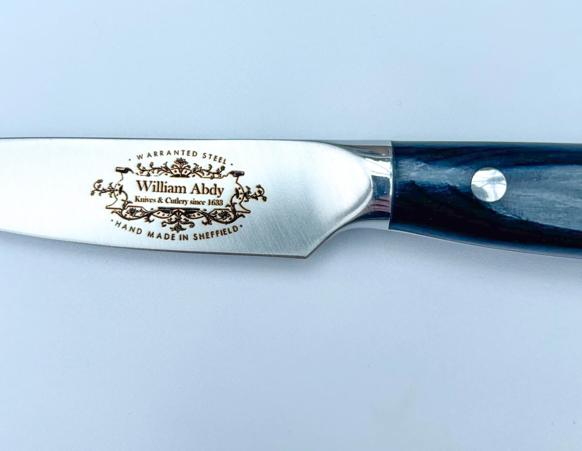 black handle 4" cook's knife